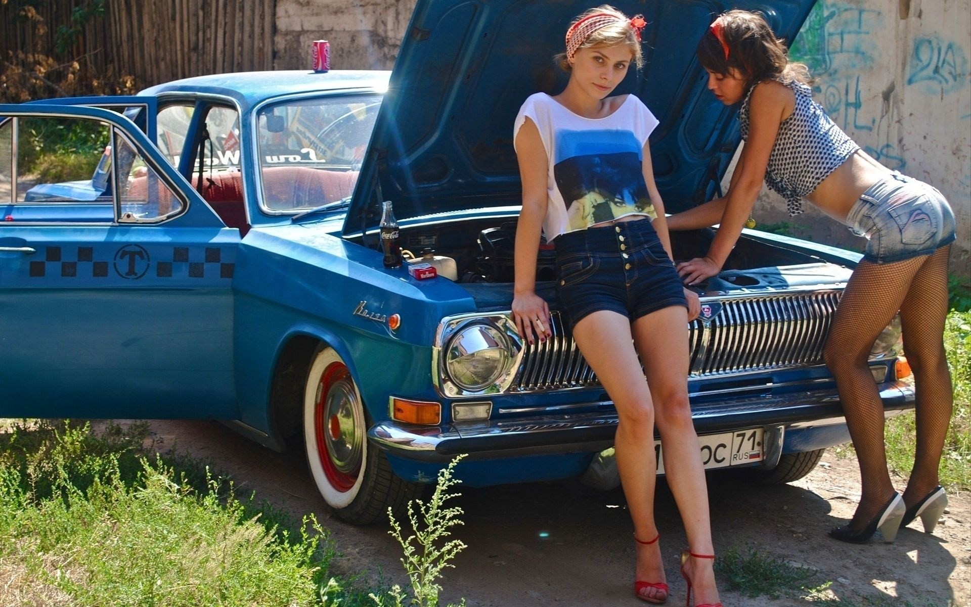 a woman sexy girl vehicles blue taxi gas volga