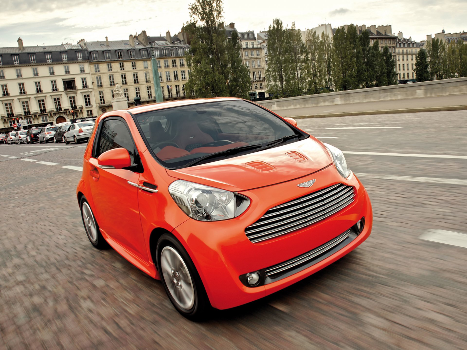 aston martin cygnet car aston martin orange