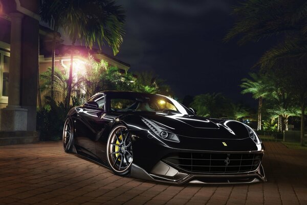 Noir ferrari F12 berlinetta vue de face