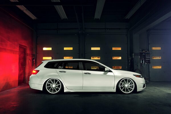 White car on dark background