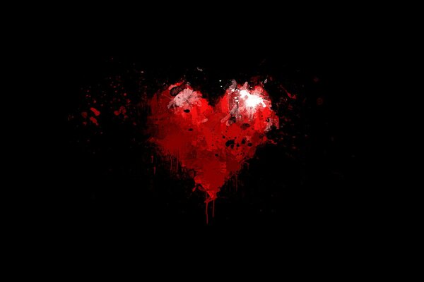 Coeur rouge sur fond sombre