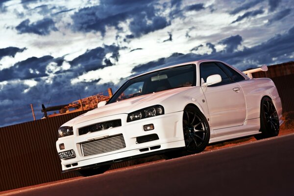 Beautiful white Nissan on the road