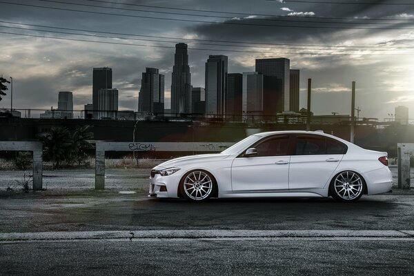 Urban landscape and white BMW