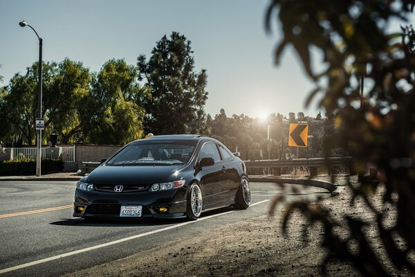 Honda civic black on the stens road