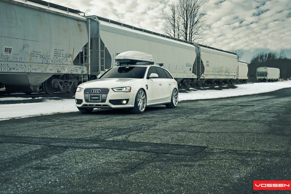 White rausch next to the cars