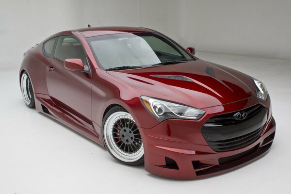 Tuned Hyundai Genesis of red color