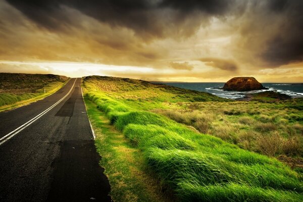 The road along the coast is beautiful: there were rocks, coast and boundless ocean around