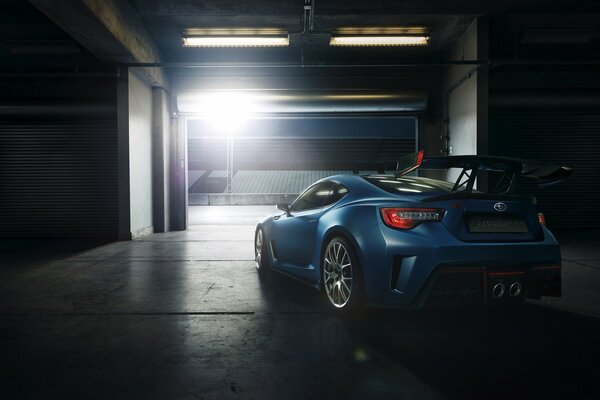 Sports car subaru blue in the garage