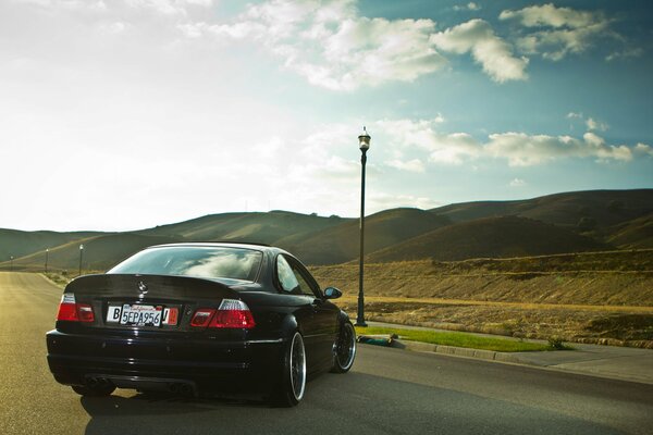 Black BMW at the lamppost