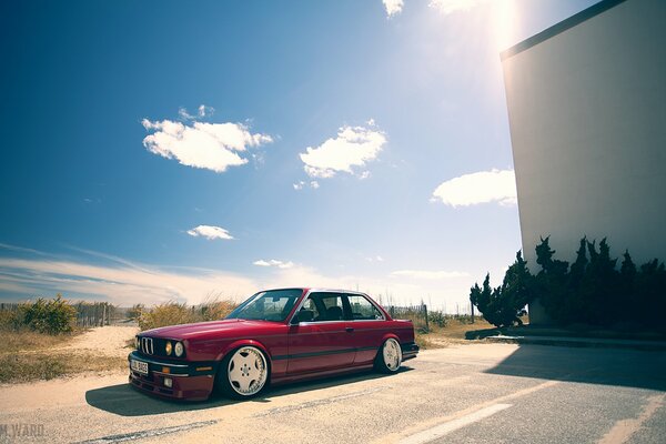 Tuned BMW with discs in nature