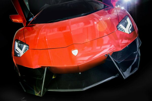 Red lamborghini car with open doors