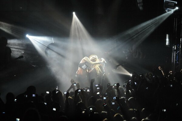 The performer in the spotlight in the concert hall