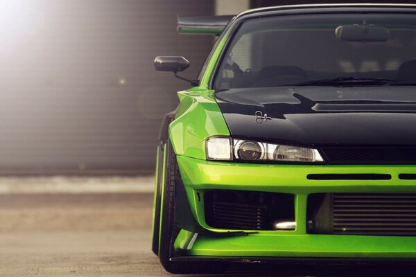 Green sports car Nissan Silvia s14