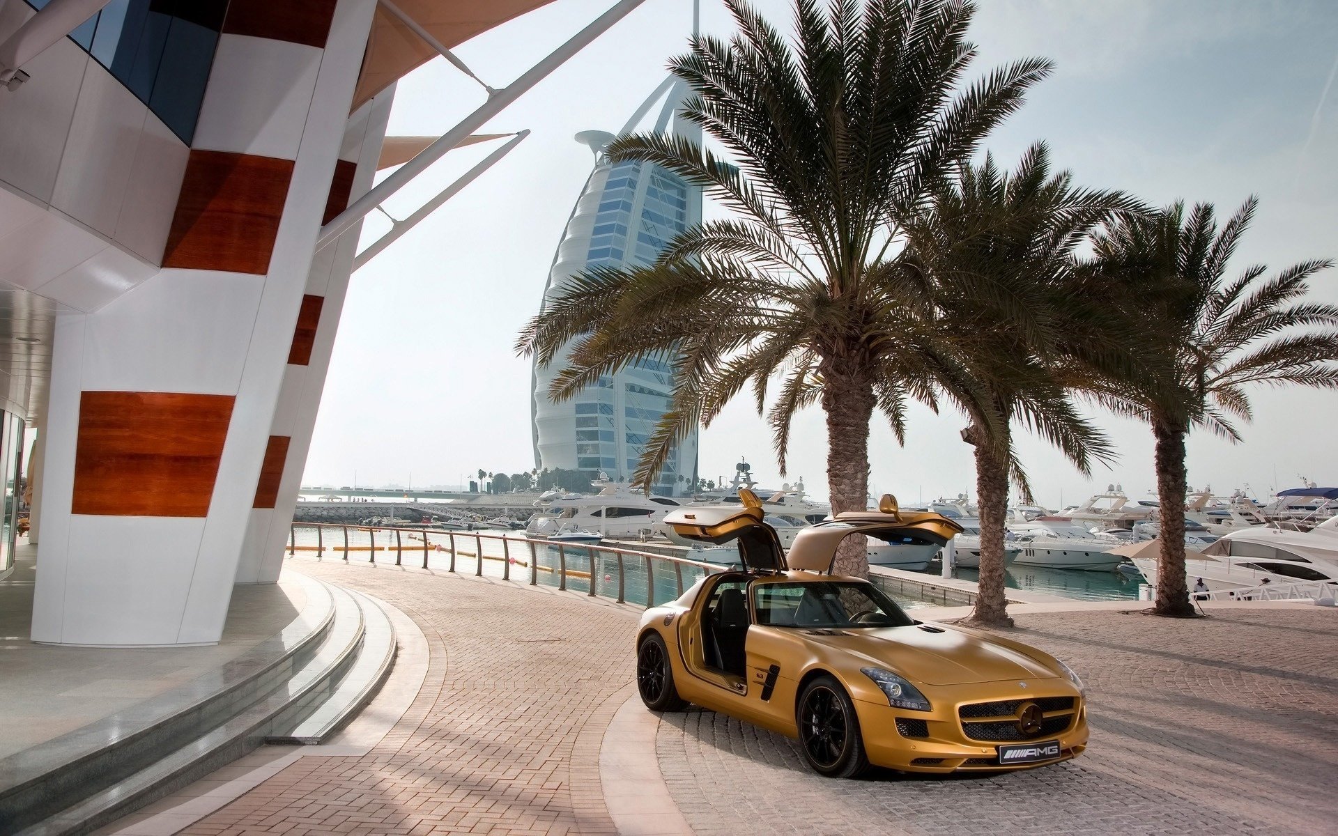 mercedes warm yachten palmen benz dubai abu dhabi hotel straße gelb mercedes sls dubai himmel meer ozean sportautos transport auto kraftfahrzeuge