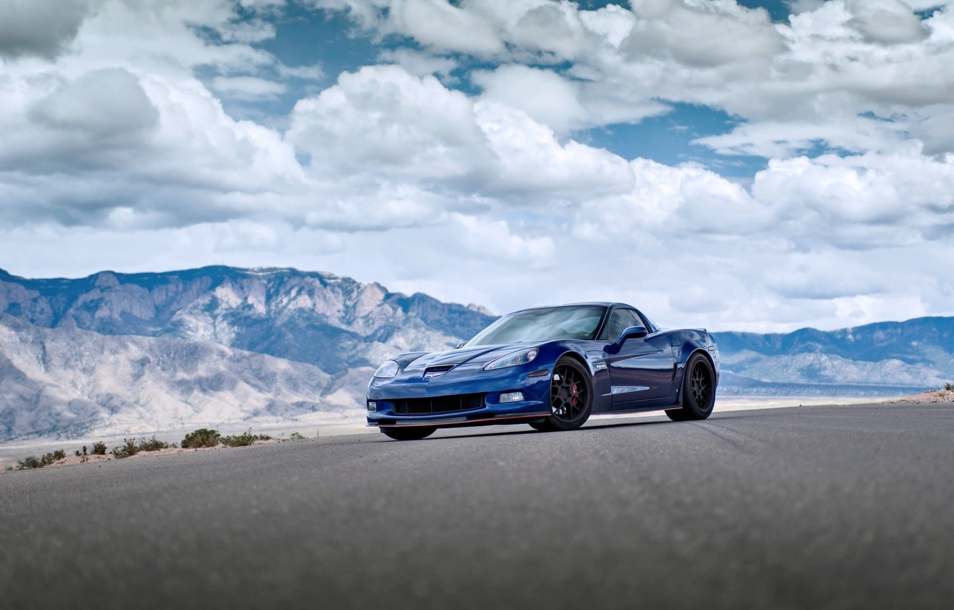 chevrolet corvette z06 blu chevrolet corvette montagne cielo nuvole