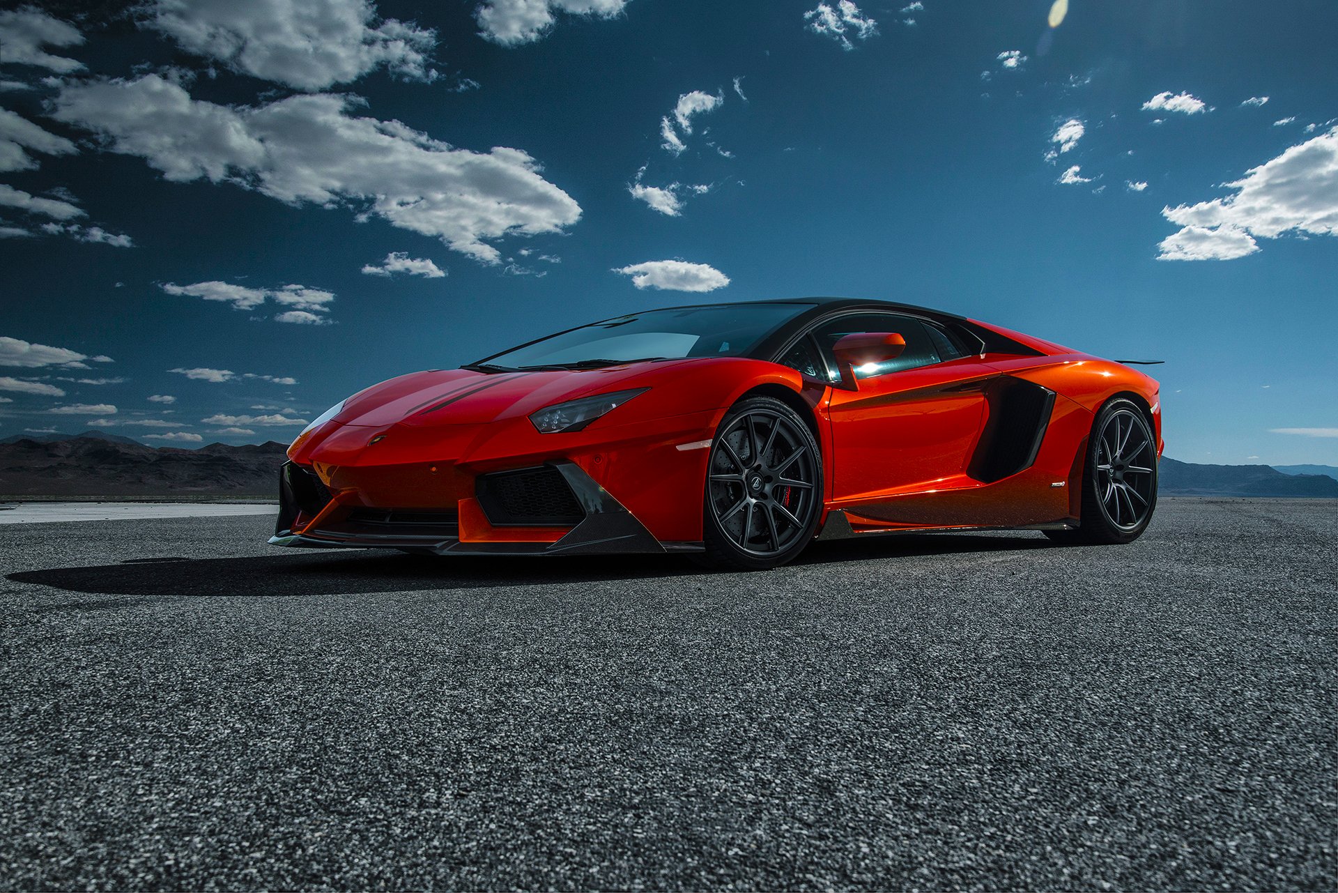 lamborghini aventador-v lp740-4 saragozza vorsteiner supercar arancione anteriore deserto cielo nuvole