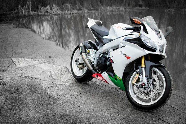 White motorcycle on a gray background