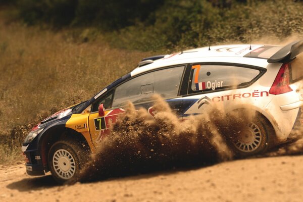 Citroen C4 sports car in rally photo in a skid