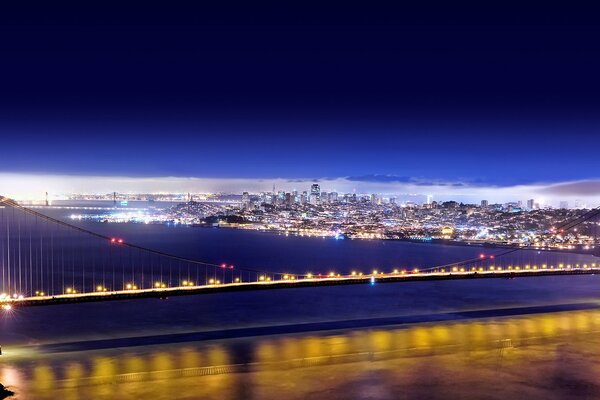 The night bridge sparkles with its lights