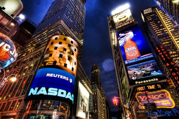 A night metropolis illuminated by neon advertising on skyscrapers