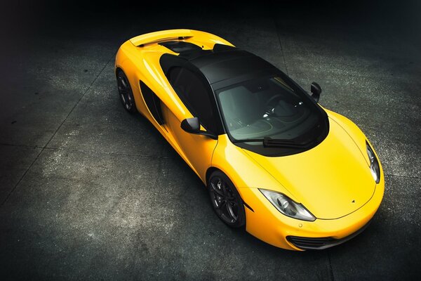 Yellow McLaren supercar - top-side view