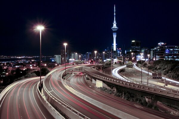 A car path of light on the road