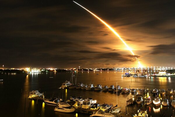 Rocket launch at night at the pier