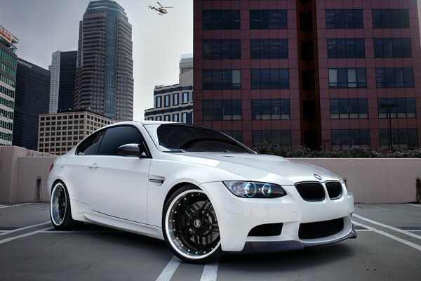 White BMW on the city street