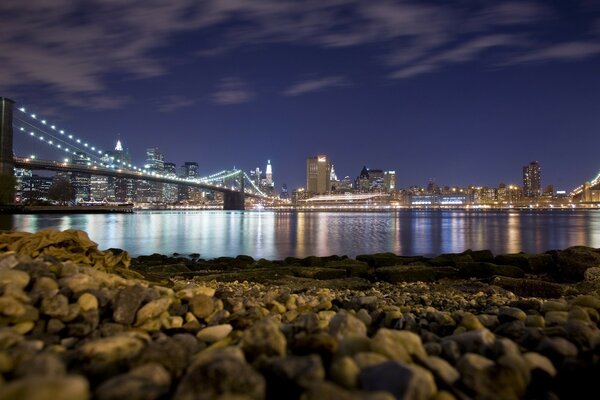 Night beach bridge in lights