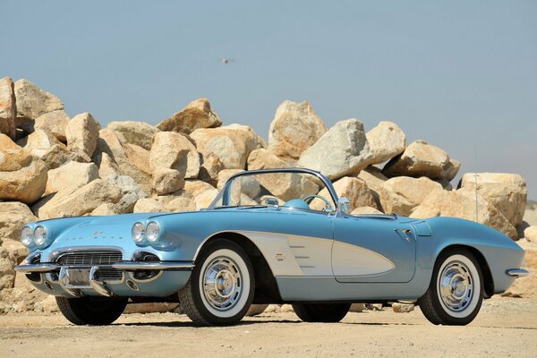 A rare Chevrolet was parked near the coast and against the background of a stone quarry