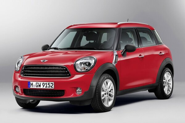 The red car. a car for a girl. Mini Cooper