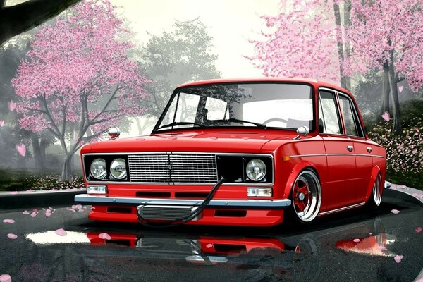 Stylish red car on the background of sakura