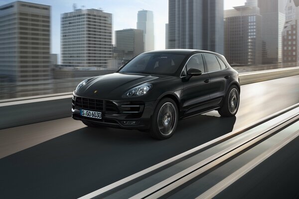 Porsche Macan turbo SUV on the streets of the city