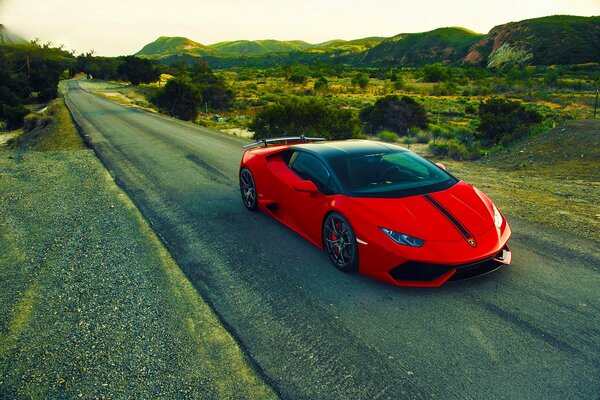 Red lamborghini on the way, green background