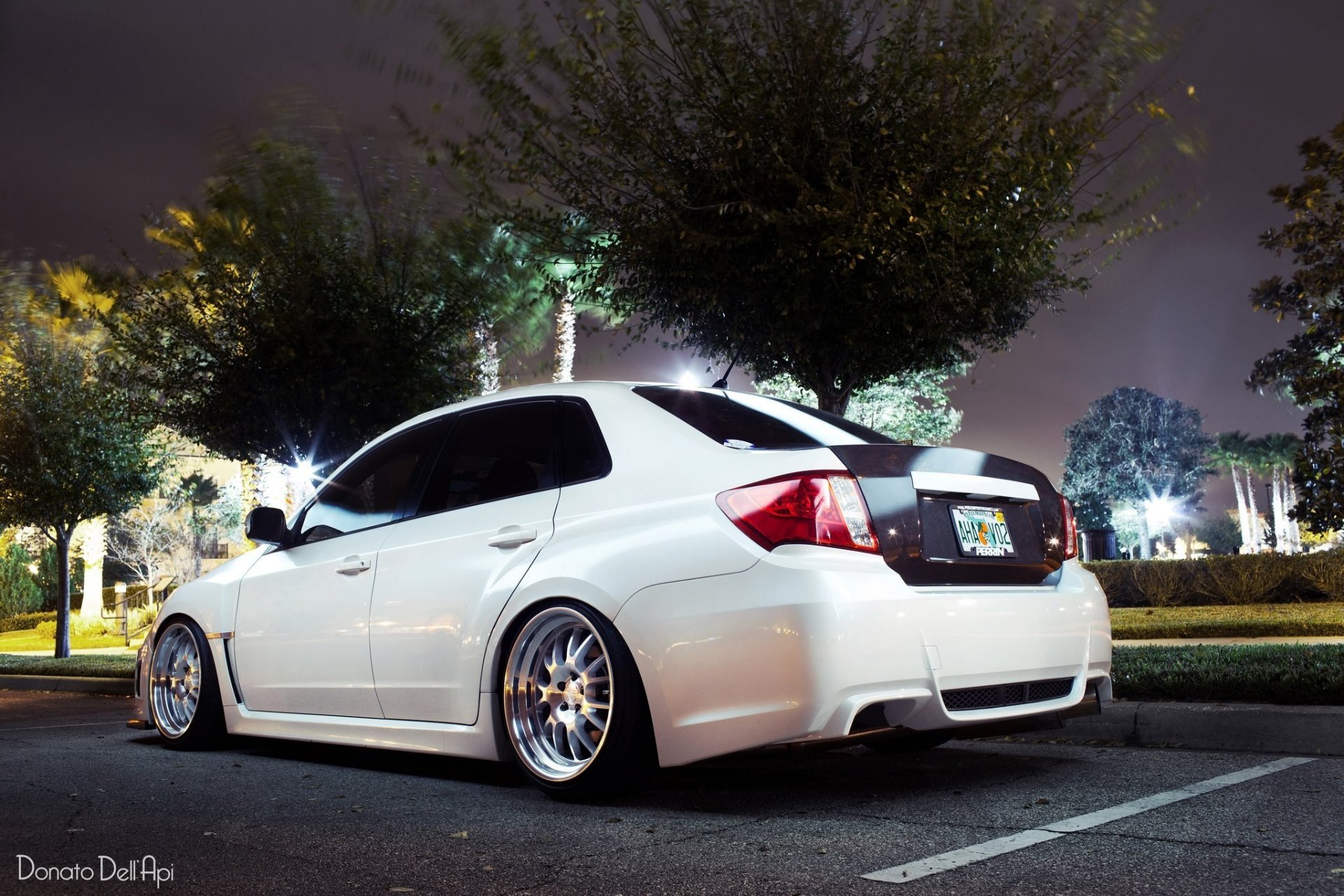 ubaru impreza machine white on the street lights car