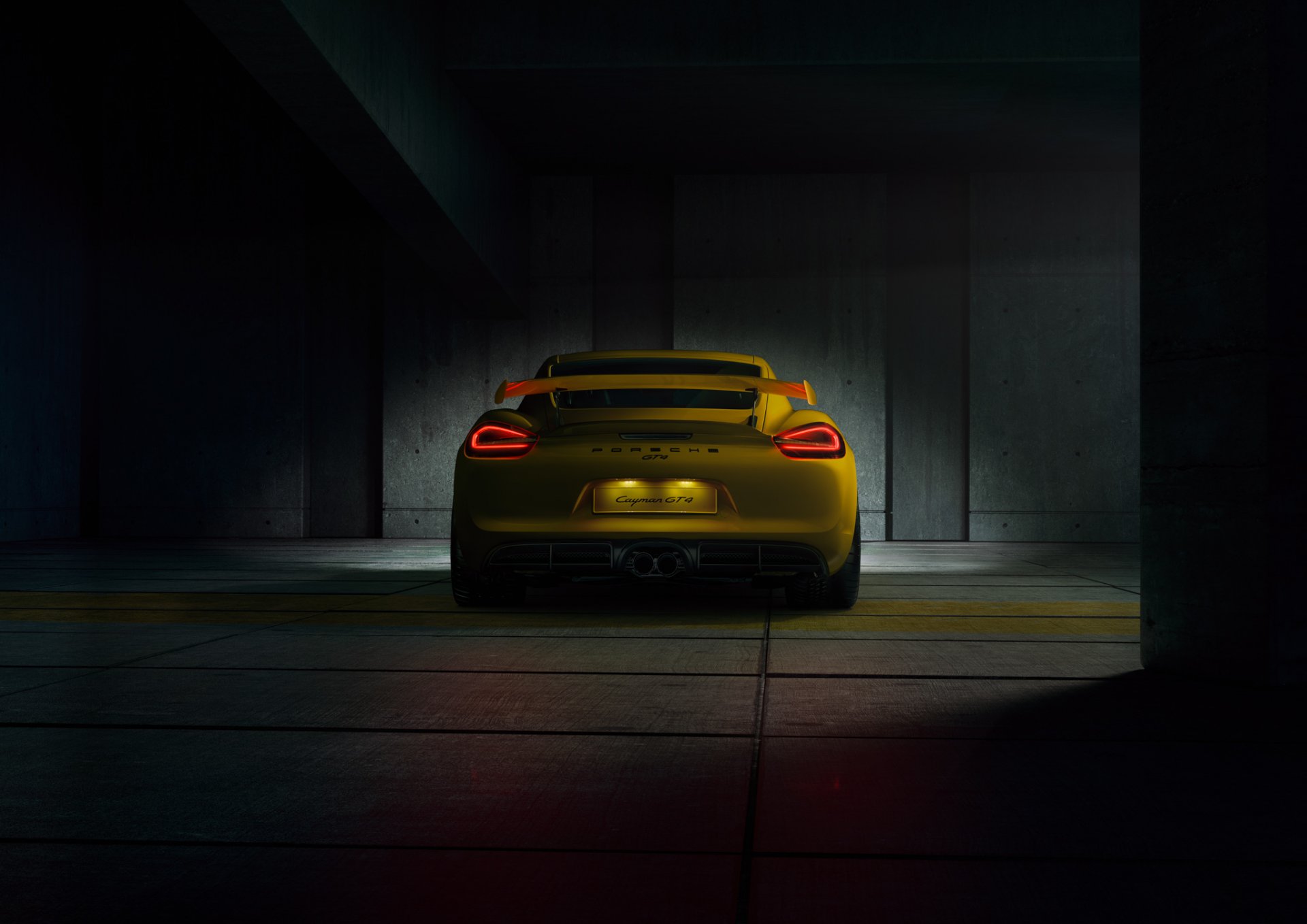 porsche cayman gt4 2015 żółty supersamochód parking jasny tył