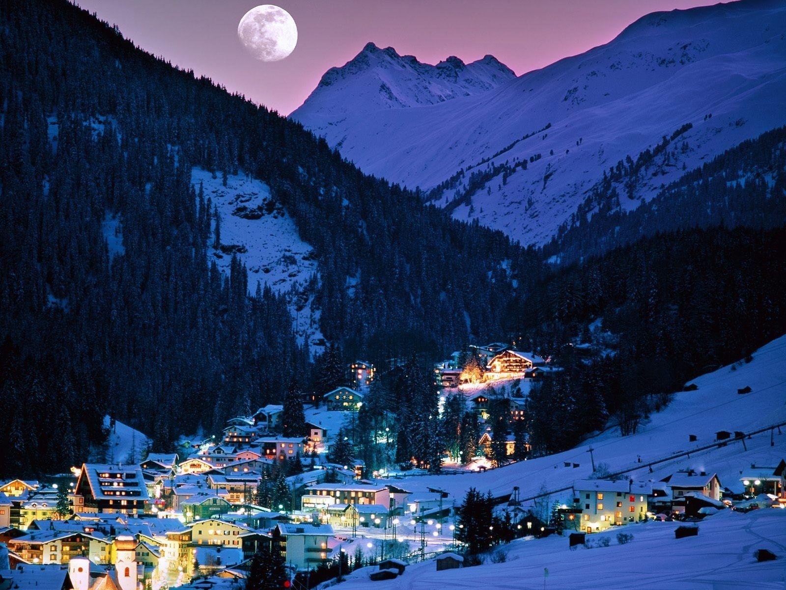 mountains alps snow winter lights village the evening the sky the moon forest night