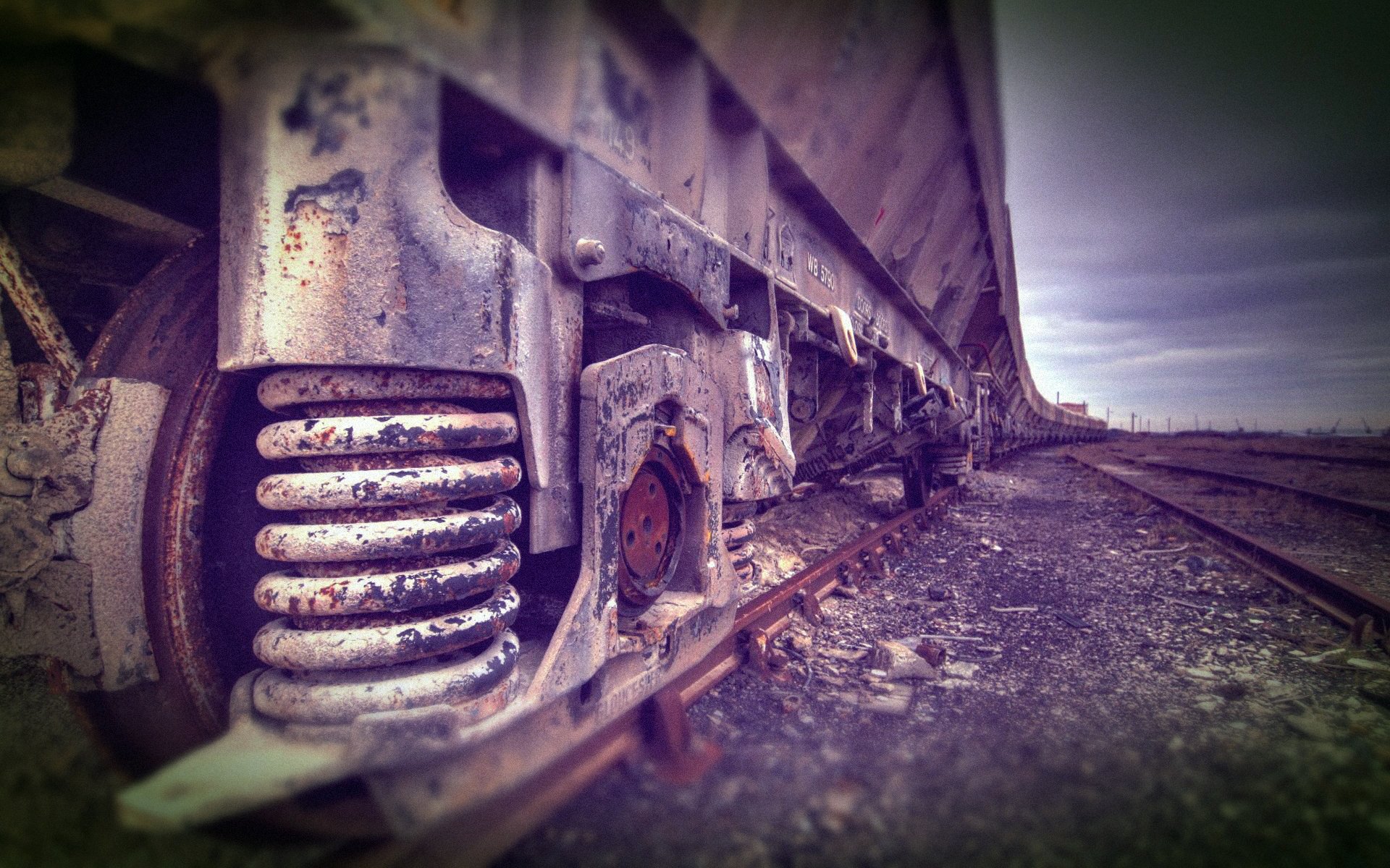 train cars spring rails sleepers steel road close up