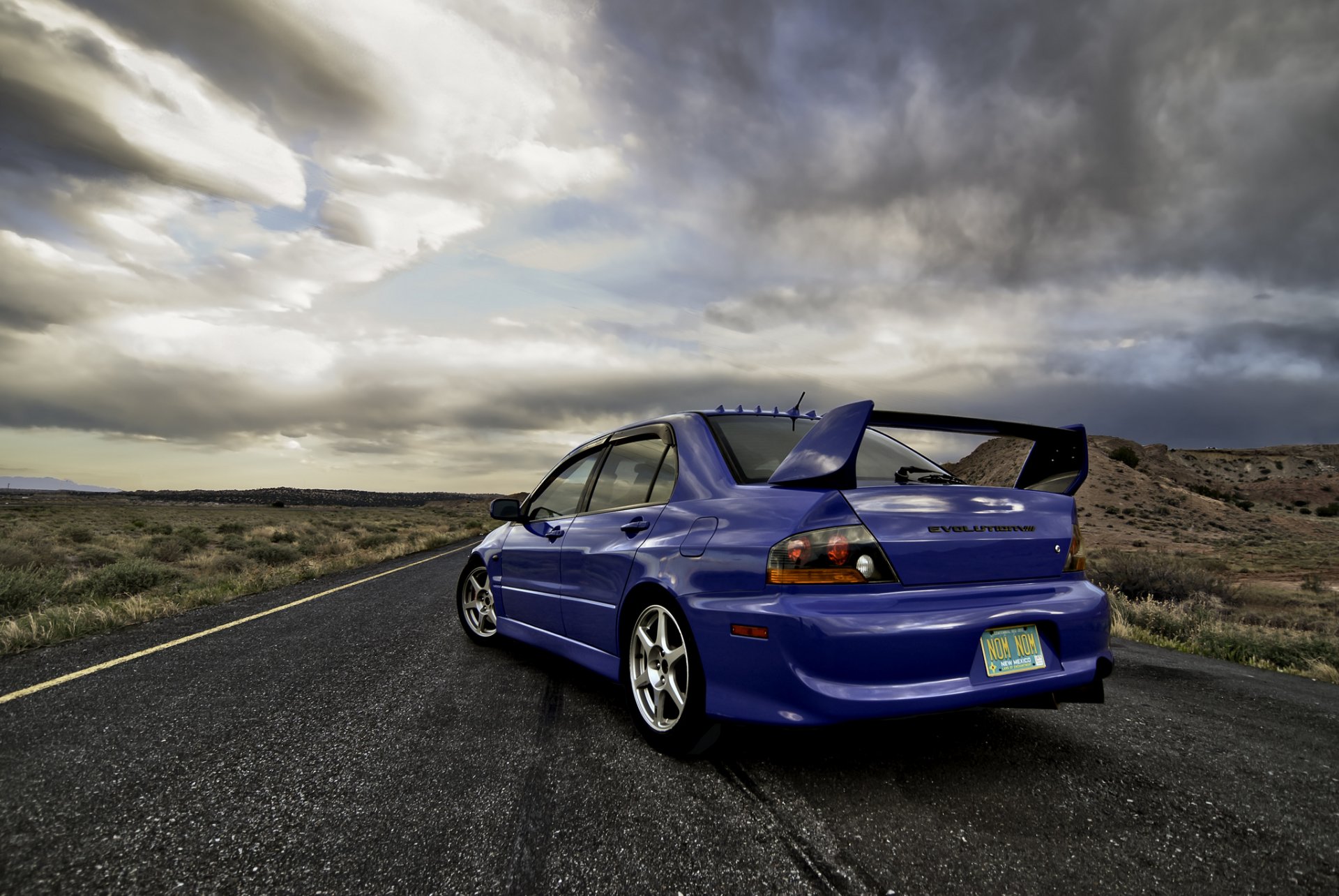 mitsubishi lancer evolution viii blue mitsubishi lancer evolution rear sky clouds body reflection