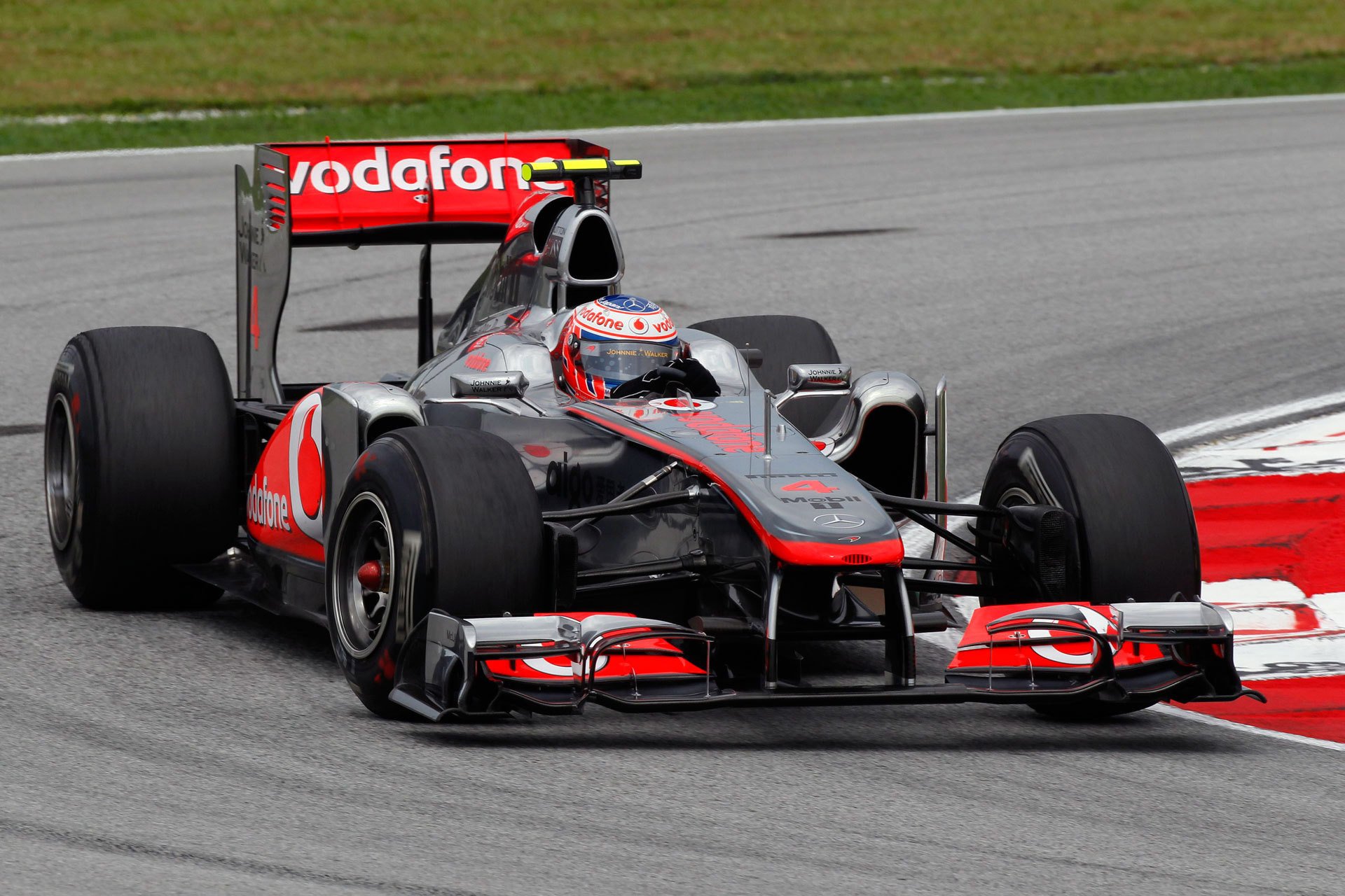 mclaren mp4-26 2011 malaysischer gp sepang formel 1 jenson button f1 mclaren kuala lumpur geschwindigkeit drehen foto motorsport