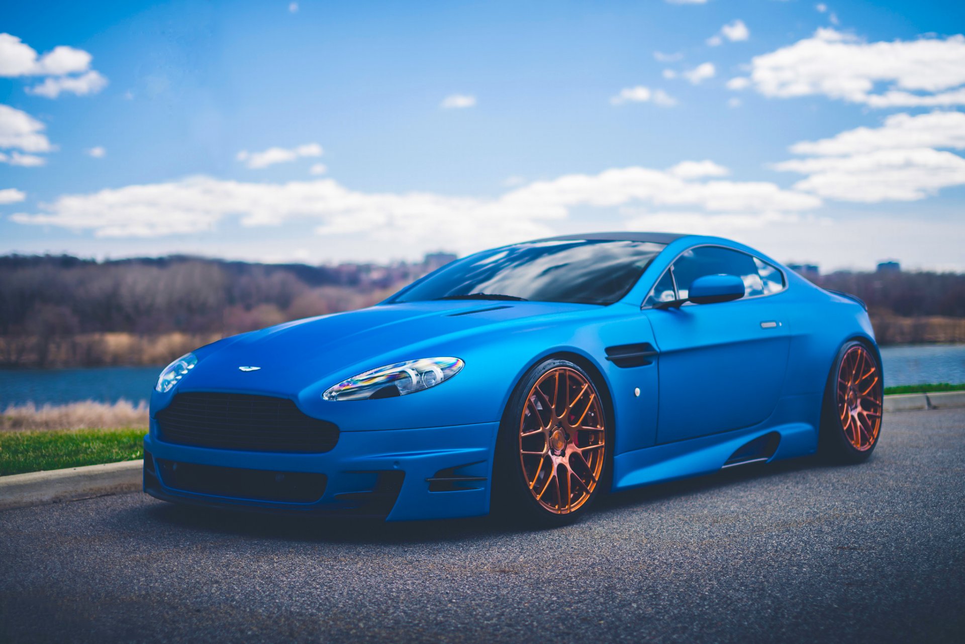 aston martin vantage v12 blue sport car stancenation road front