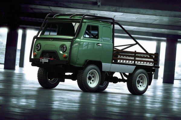 Green truck in the parking lot