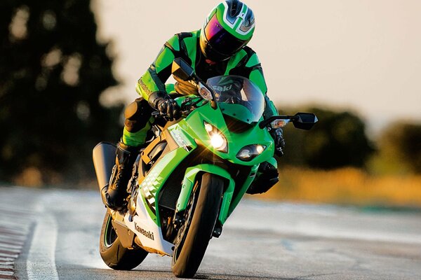 A motorcyclist entering a sharp turn