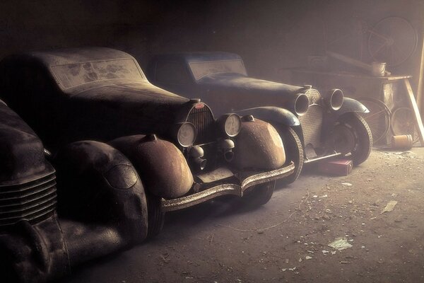 Vintage cars covered in dust