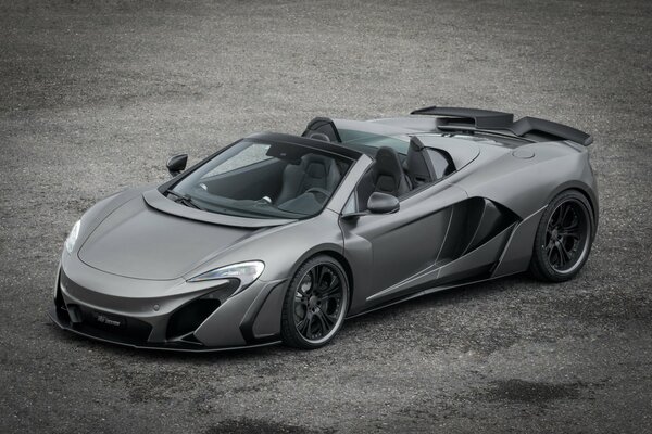 Grey mclaren car on a grey background