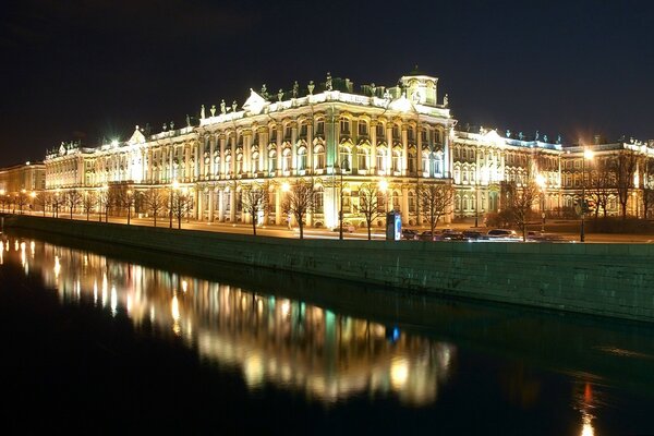 Reflection of the Hermitage at night. Peter