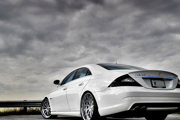 Mercedes-Benz car on a gray sky background