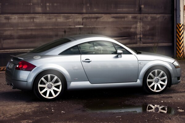 Passenger sports car in gray