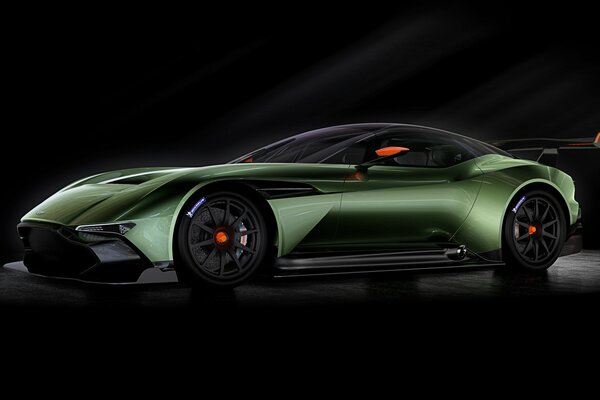 Green 2015 Aston Martin with a body kit