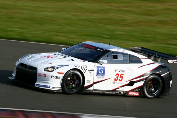 White Nissan super gt car